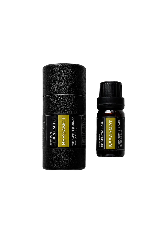 'Bergamot' essential oil bottle and packaging on a transparent background