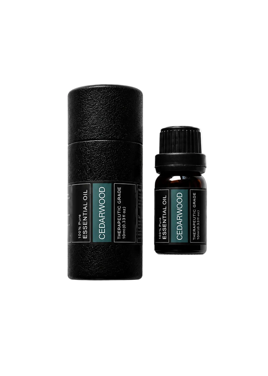 'Cedarwood' essential oil bottle and packaging on a transparent background