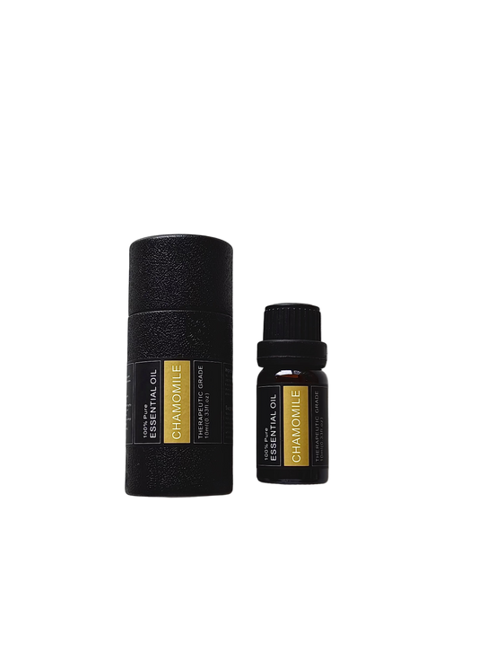 'Chamomile' essential oil bottle and packaging on a transparent background
