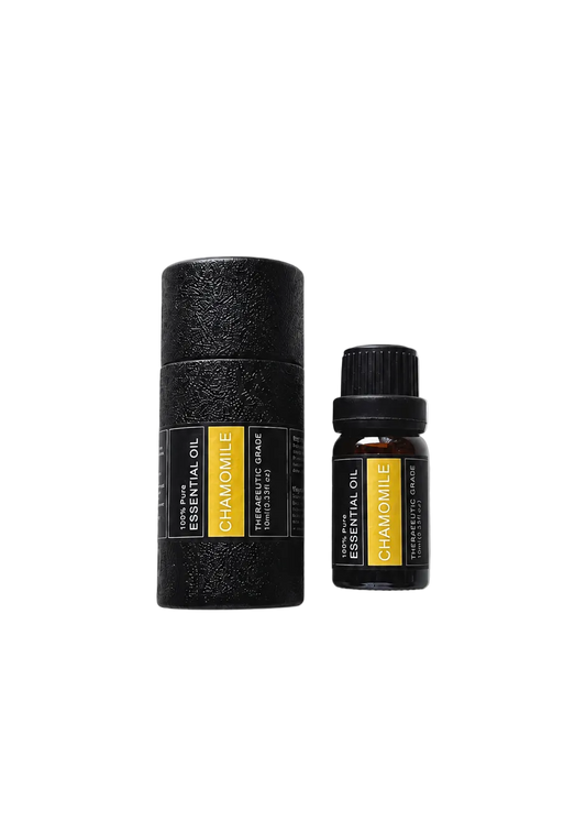 'Chamomile' essential oil bottle and packaging on a transparent background