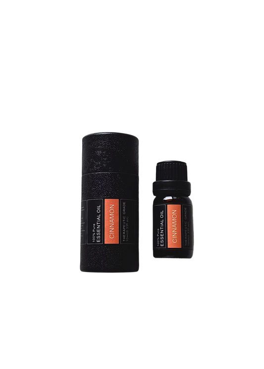 'Cinnamon' essential oil bottle and packaging on a transparent background