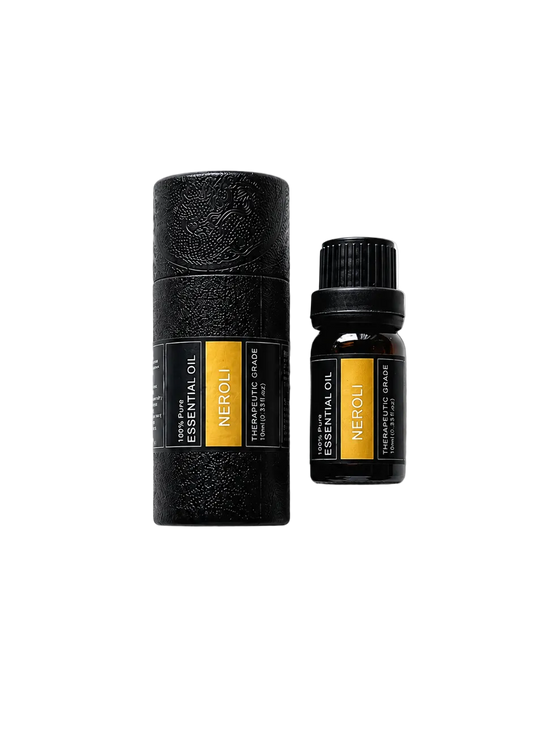 'Neroli' essential oil bottle and packaging on a transparent background