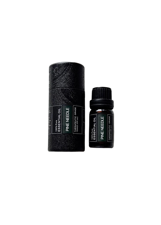 'Pine Needle' essential oil bottle and packaging on a transparent background