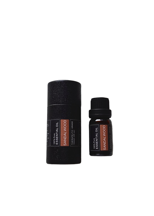 'Sandalwood' essential oil bottle and packaging on a white background