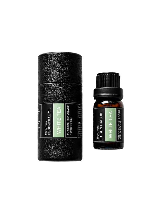 'White Tea' essential oil bottle and packaging on a transparent background